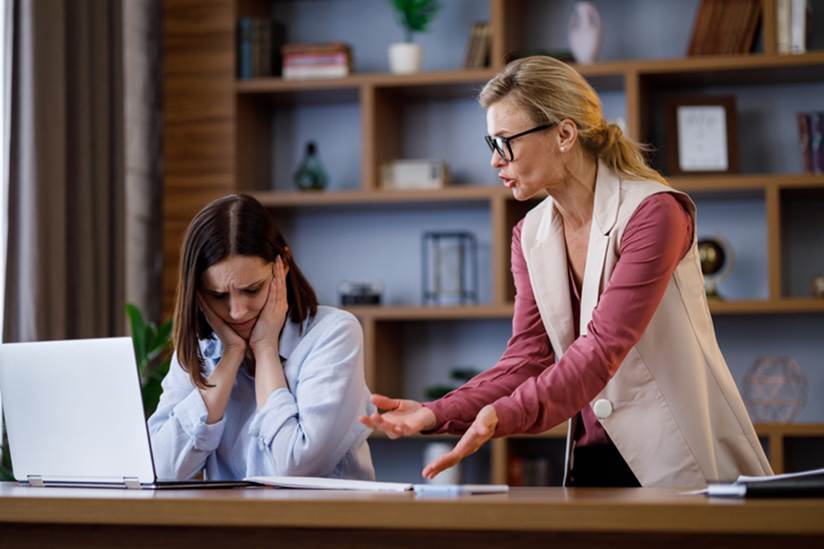 Woman yelling at female employee - Hostile Work Enviorment
